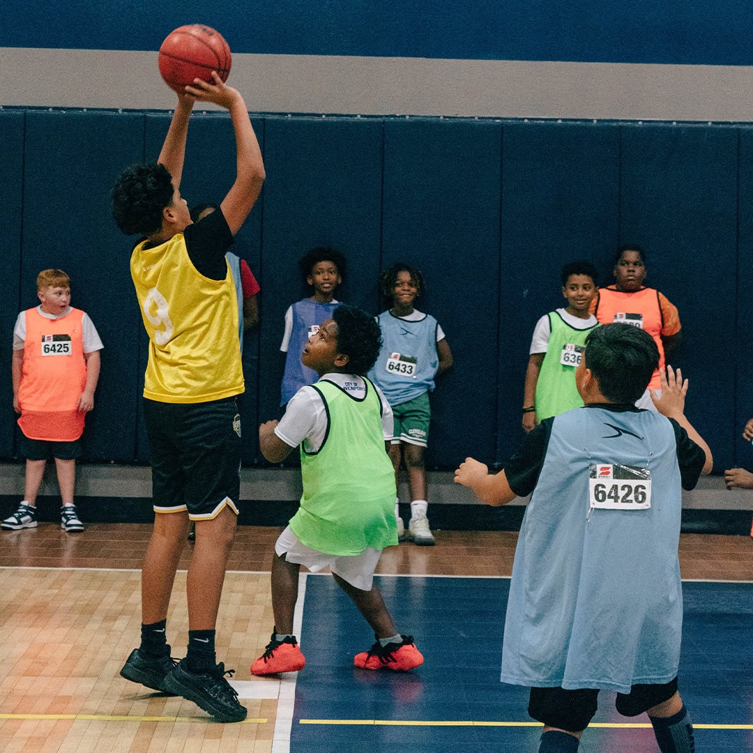 Basketball & Cheer Camp - kids playing basketball