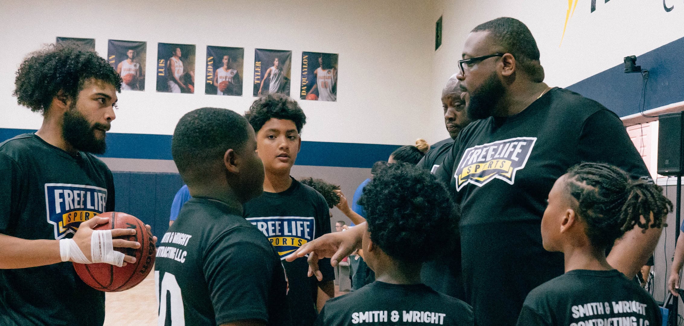 Basketball & Cheer Season - coaches talking to players during break in game